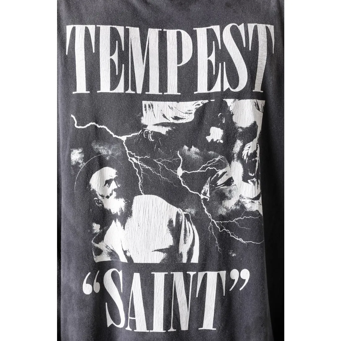 SAINT Mxxxxxx LS TEE/TEMPEST/BLK 'TEMPEST SAINT' Storm Religious Saints Cracked Retro Vulcanized Heavy Wash Long Sleeves Washed Black S-XL Assute Dyeing Multi-bit Horse Fading Craftsmanship Grinding and Hanging Holes Full of Old Feeling Top Printing Craftsmanship Purchasing Level